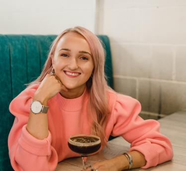 Millie Gooch with a cocktail